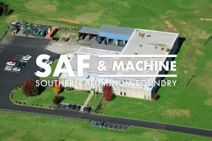 The SAF logo composited over an aerial shot of Southern Aluminum Foundry & Machine